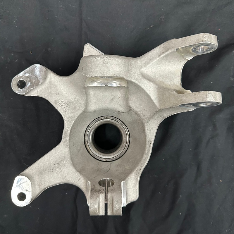 Can Am X3 (right) OEM Front Knuckle / Bearing Carrier